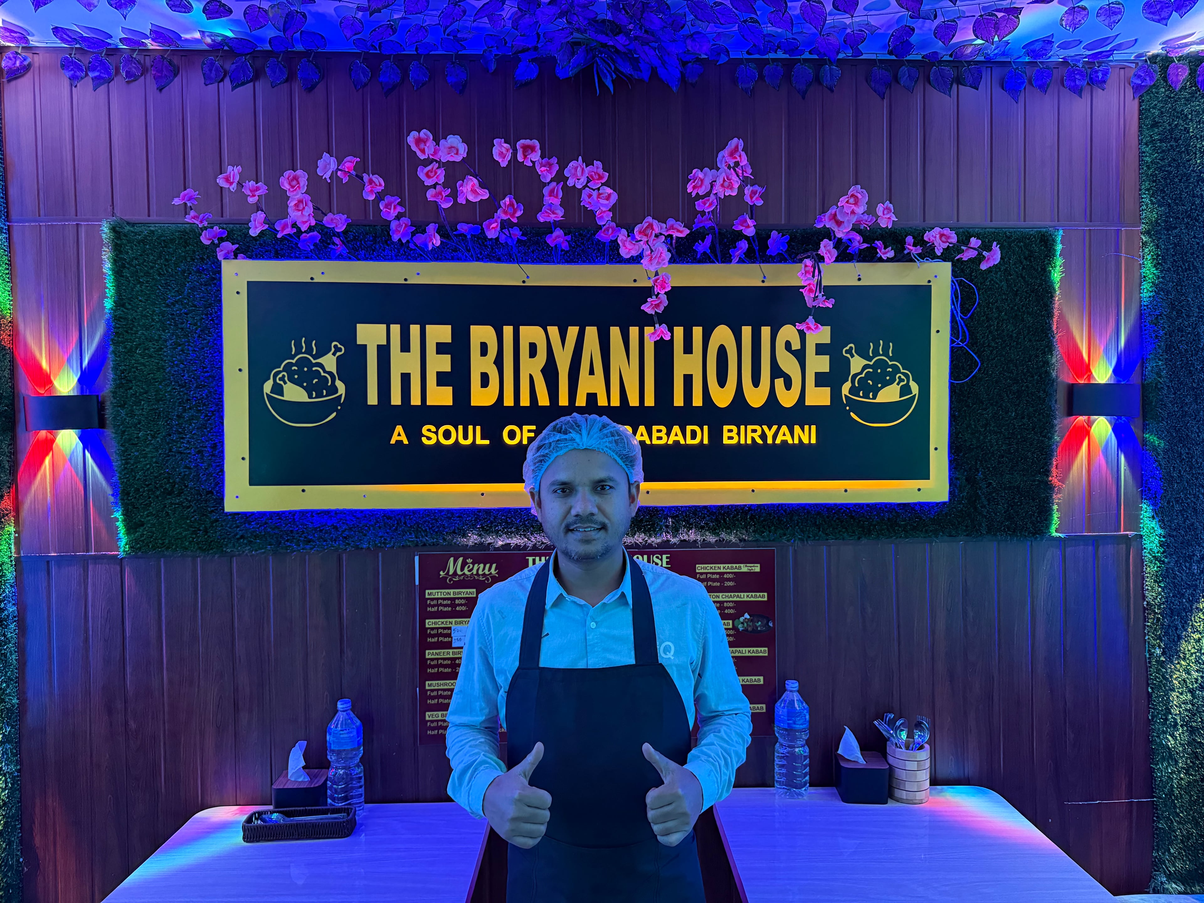 Traditional chef preparing biryani using authentic dum pukht method